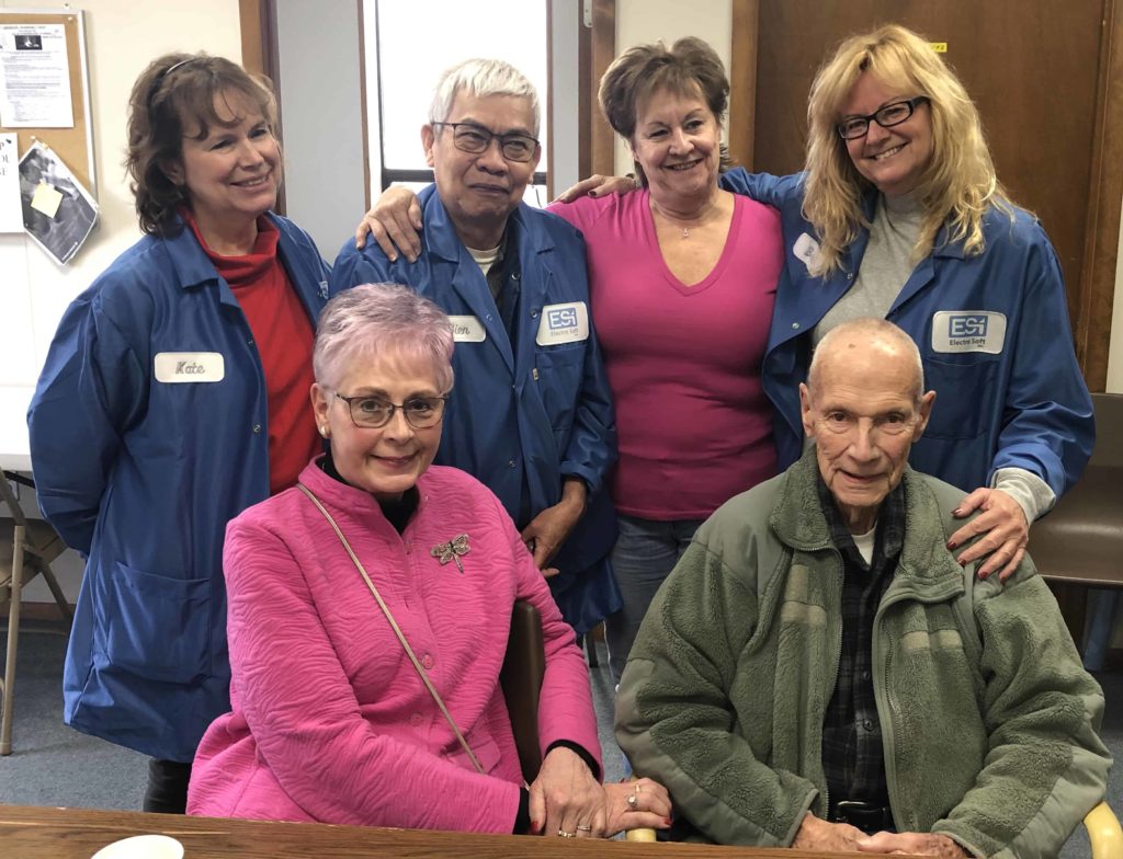 A group photo from Bien Dinh's retirement party at Electro Soft Inc. He was a POW during the Vietnam War. 